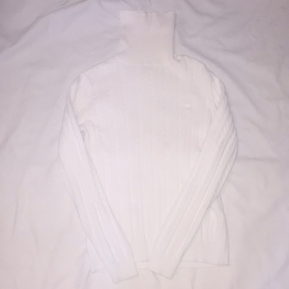 A all white Turtle neck